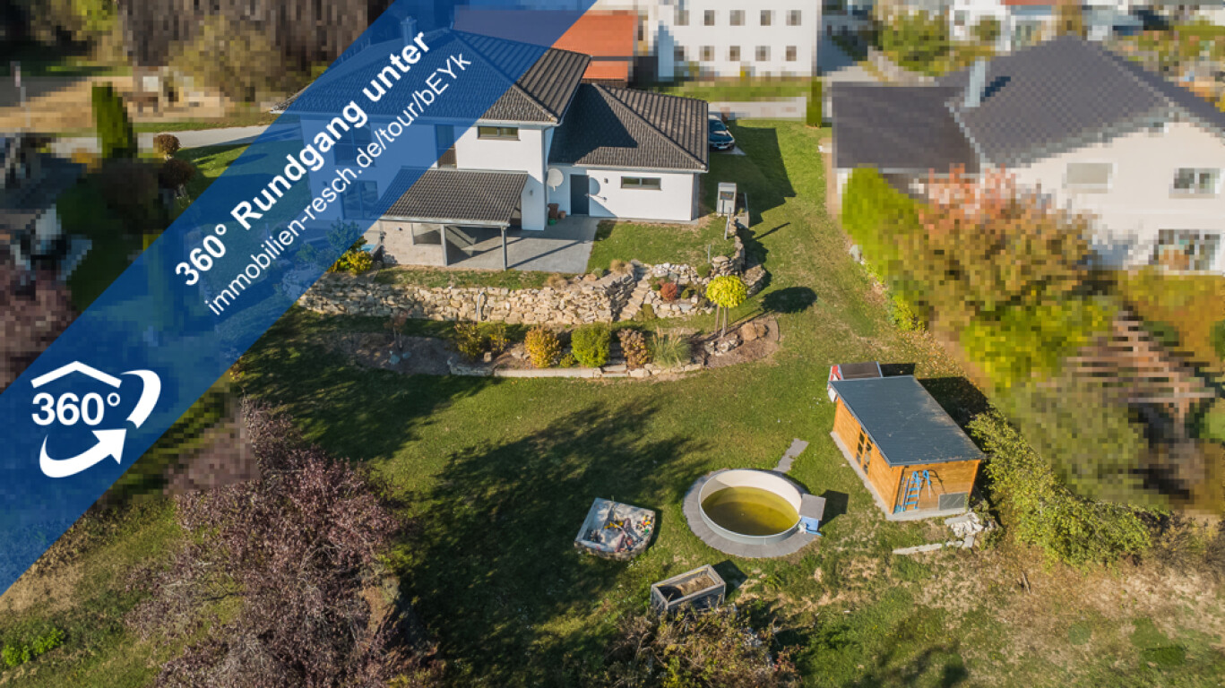 Ein Zuhause der besonderen Art – Stilvolles Einfamilienhaus mit traumhaftem Blick ins Umland
